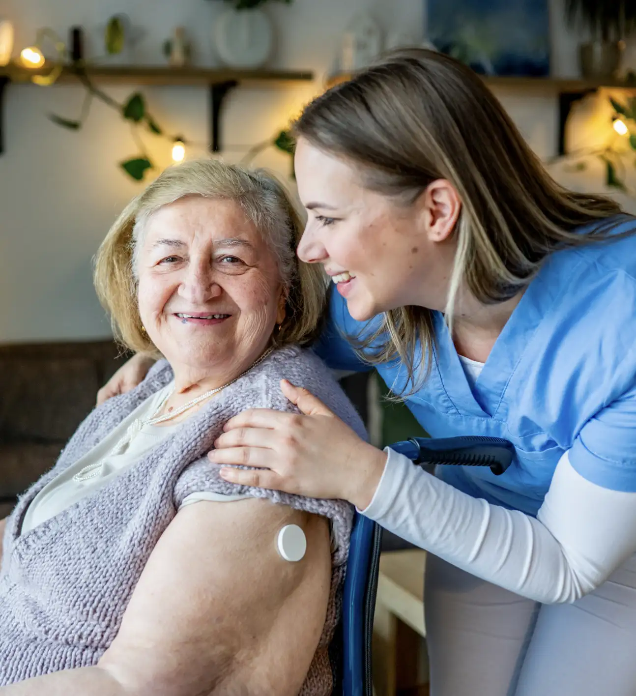 Aged care resident and care professional together in an Australian residential aged care facility.