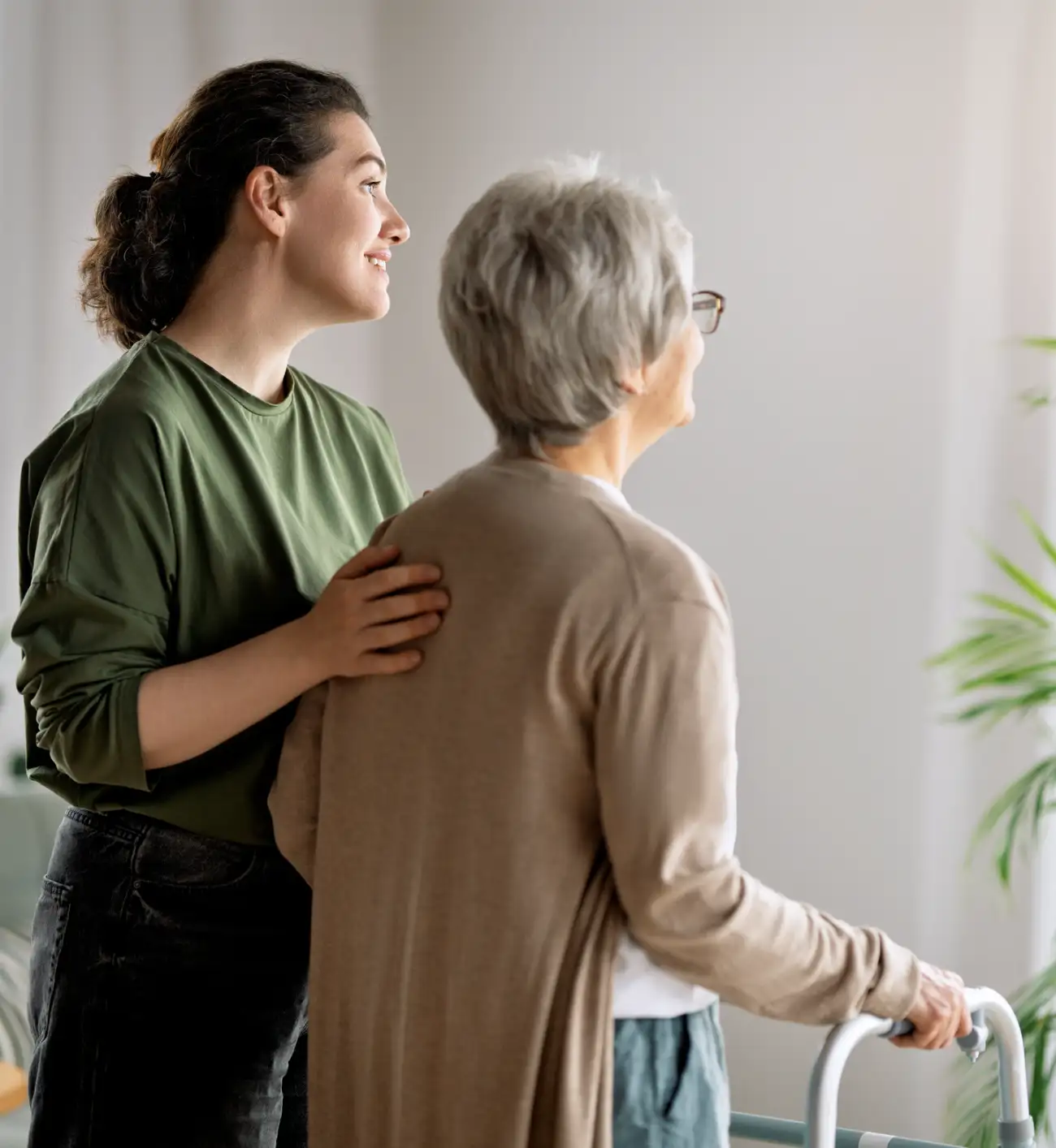 Allied Health practitioner with client in her home helping Aged care support of elderly woman in her home